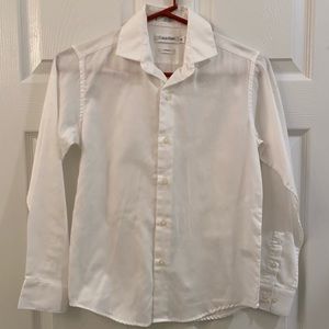 White Calvin Klein button down shirt.